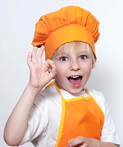 Child Wearing Chef Hat and Apron