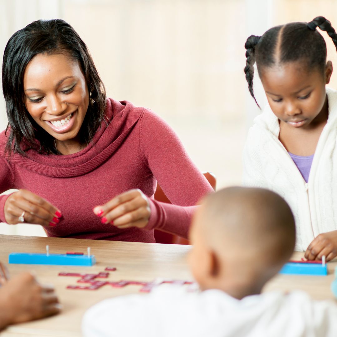 a family playing a game at a table